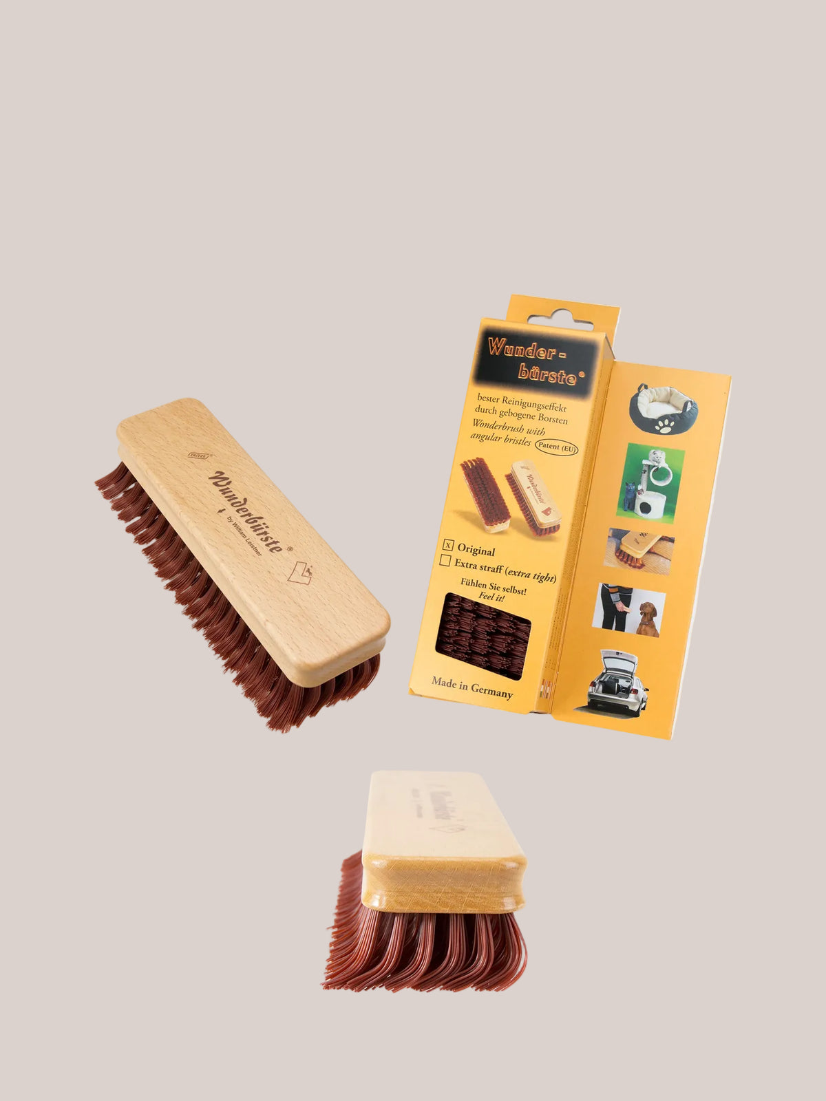 Brosse Wunderbürste de petit cochon pour nettoyer délicatement le feutre de laine foulée et autres tissus, idéale pour enlever la saleté et les poils d’animaux.