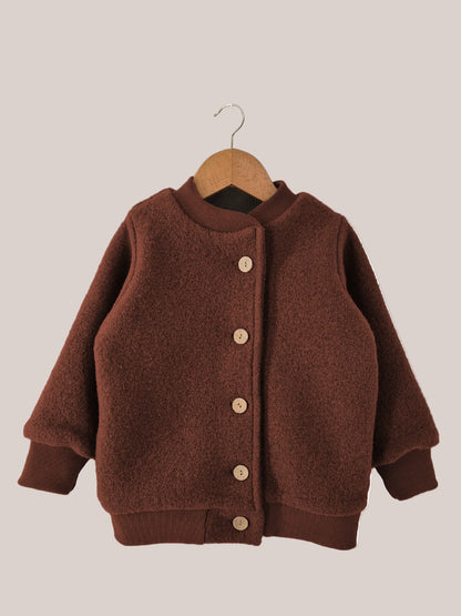 Blouson en laine bouillie couleur chocolat de petit cochon, idéal pour l’automne et l’hiver, confectionné dans un tissu foulé coupe-vent et antisalissure, avec une fermeture éclair intégrale et des bords-côtes élastiques pour un ajustement optimal.