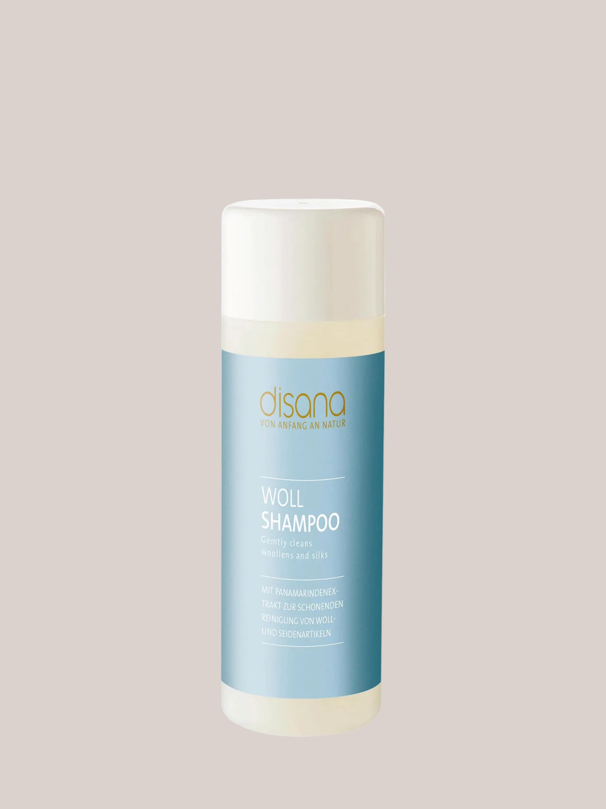 Shampoo per lana di petit cochon in flacone da 200 ml, ideale per la cura delicata di lana e seta, contiene ingredienti naturali.