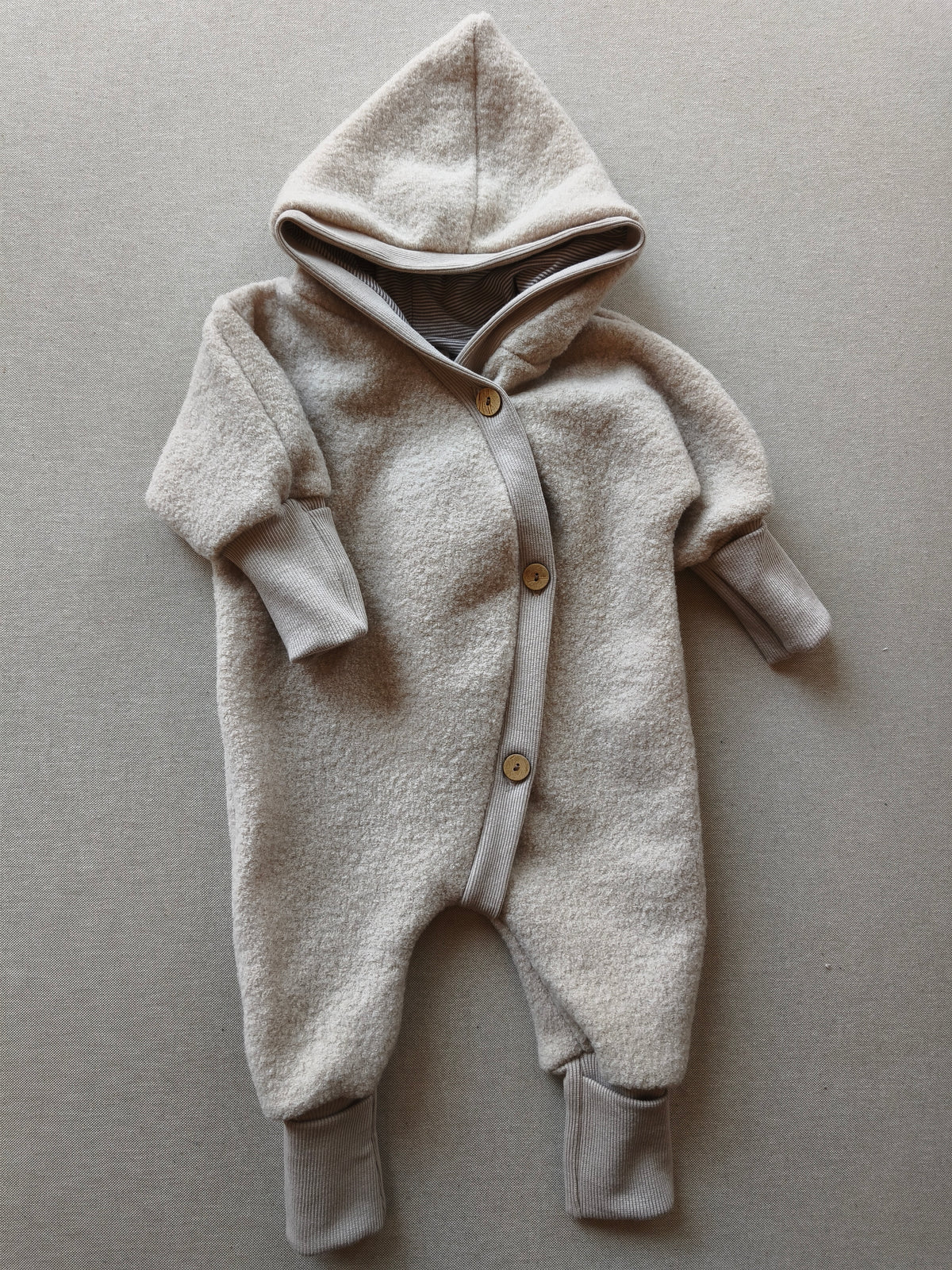 Wollwalk Overall mit Jerseyfutter Sand Gr 3M / kleiner Stofffehler am Bündchen